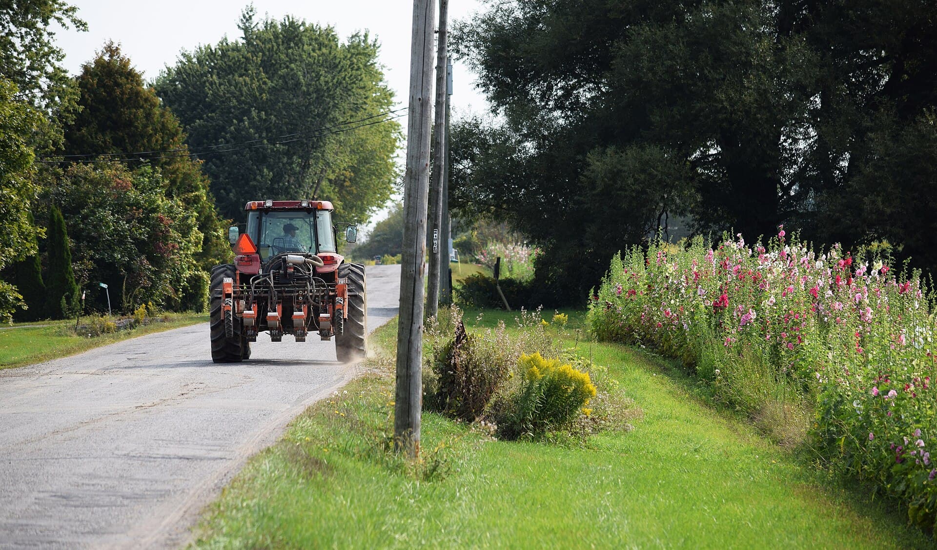 A tractor travelling on a rural Ontario road