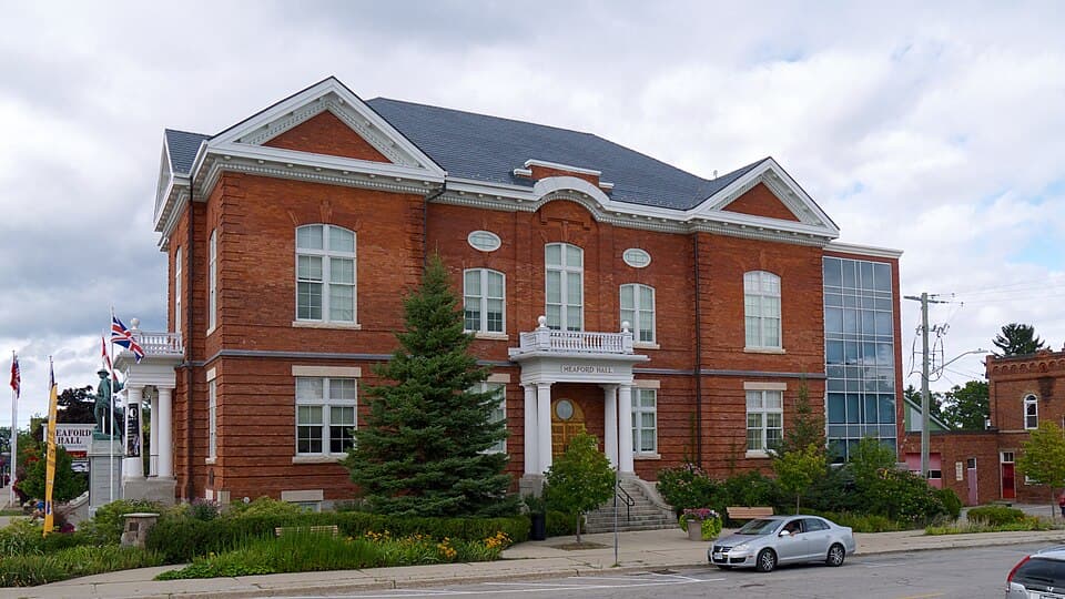 Meaford Hall, a red-brick building on a sunny day