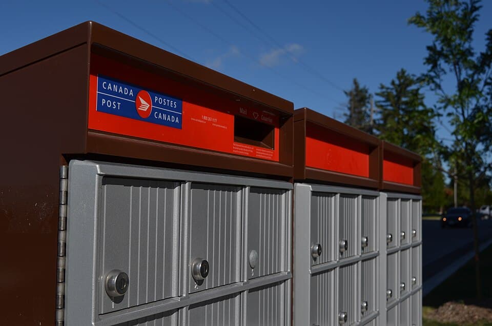 A row of Canada Post community mailboxes.