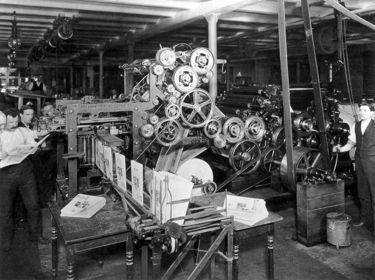A newspaper printing press room in 1898